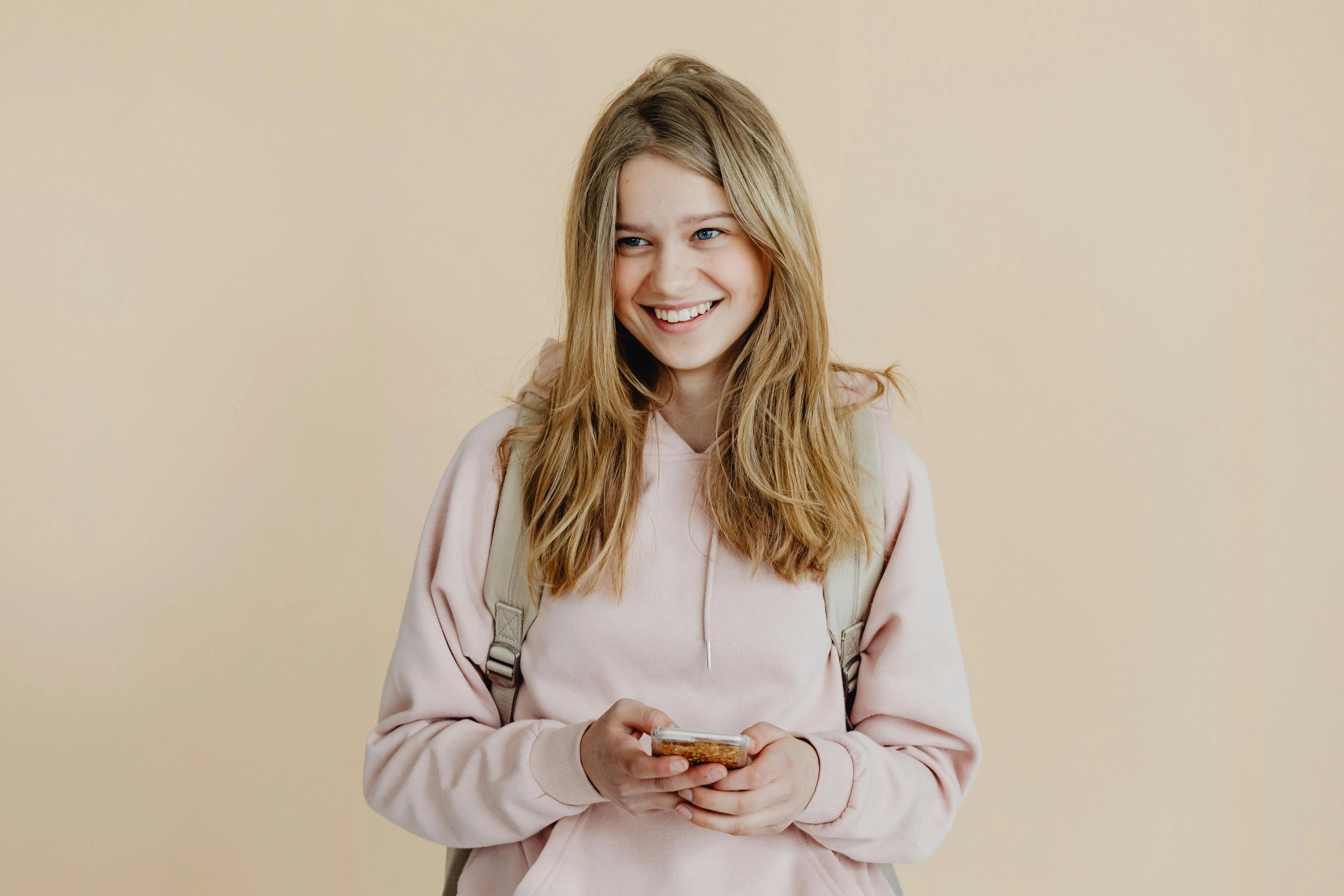 A smiling teenager