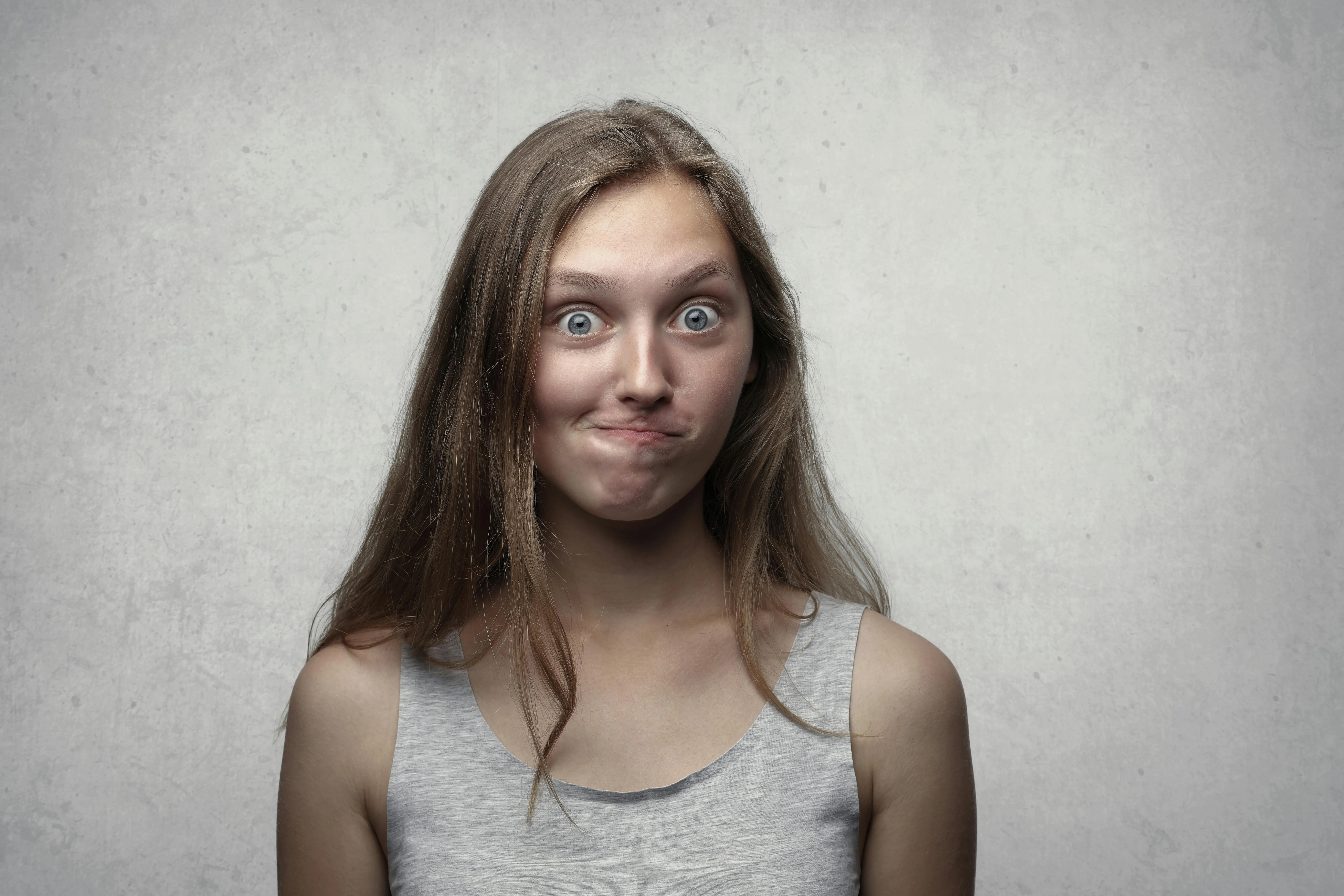 Teenager making a frustrated face