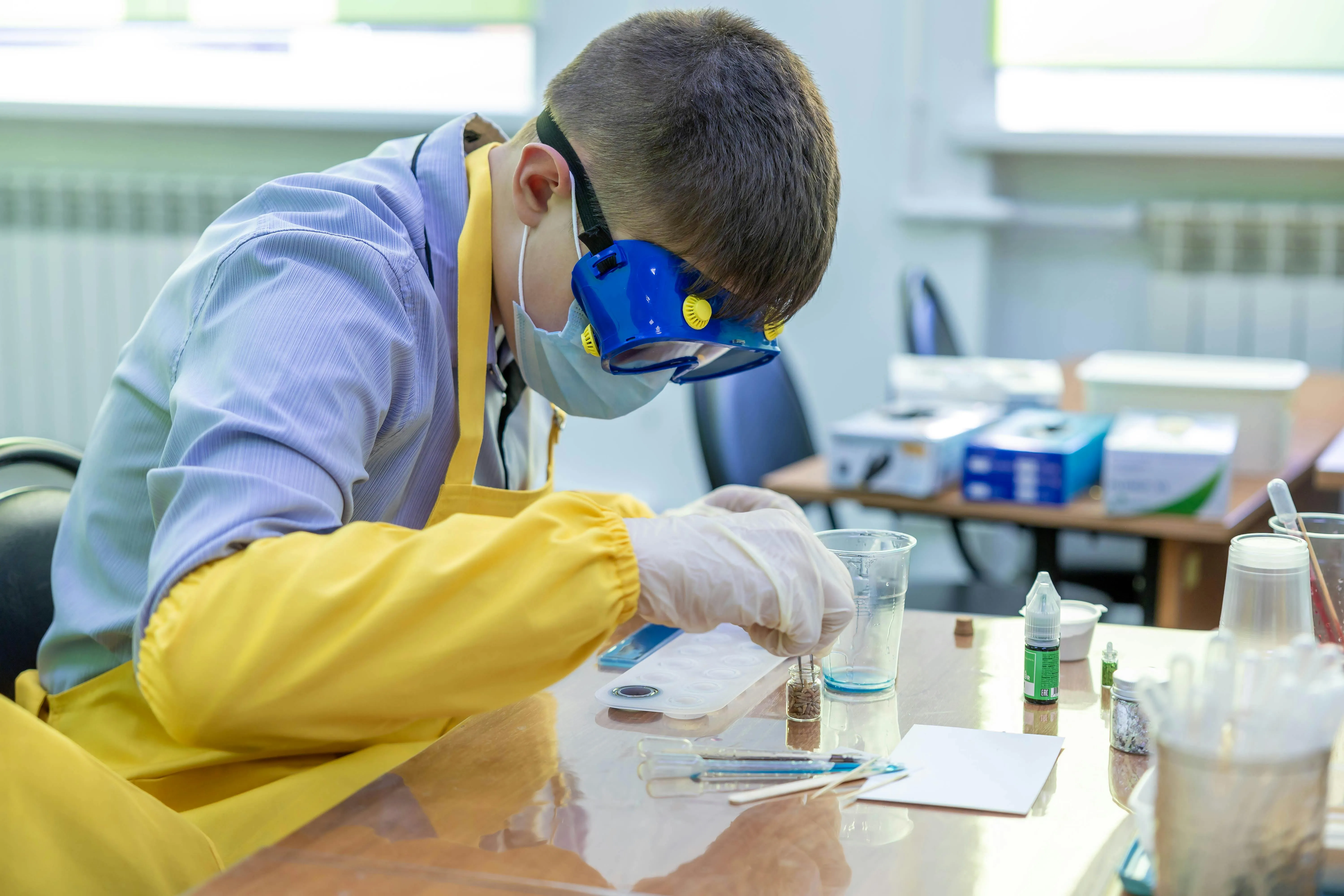 A student performing a science experiment