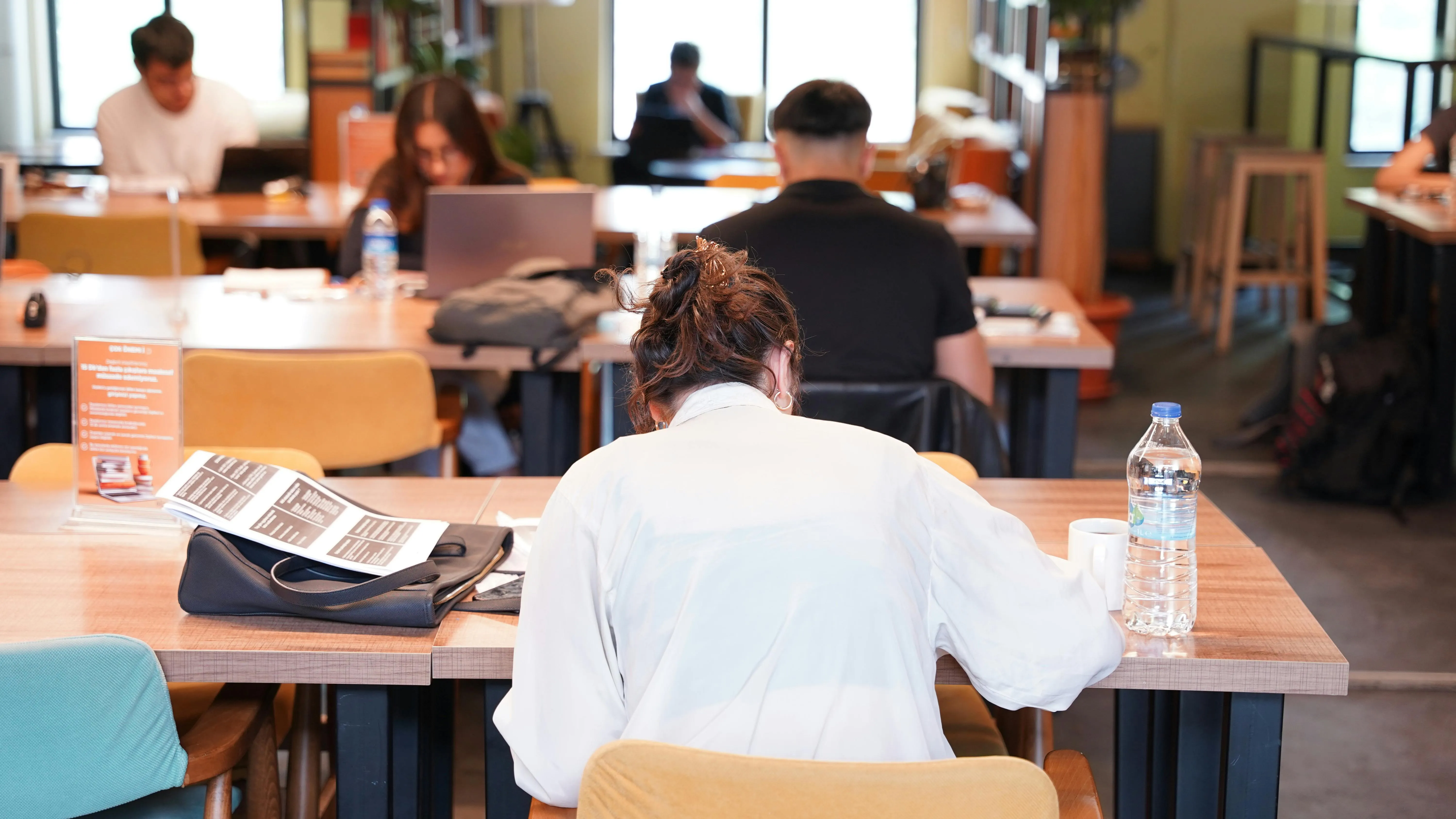 A student in a library studying