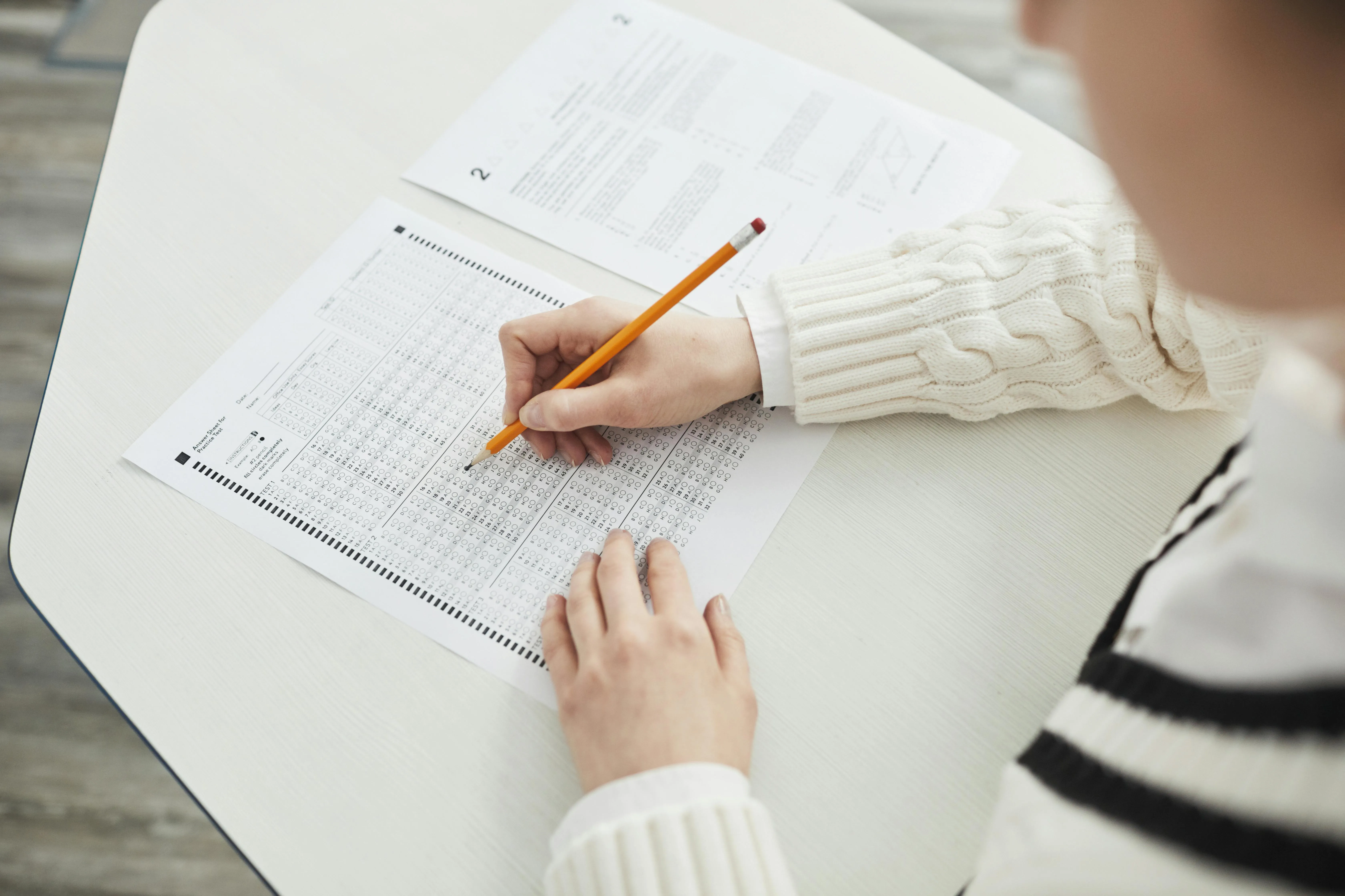 A student taking a standardized test with a bubblesheet